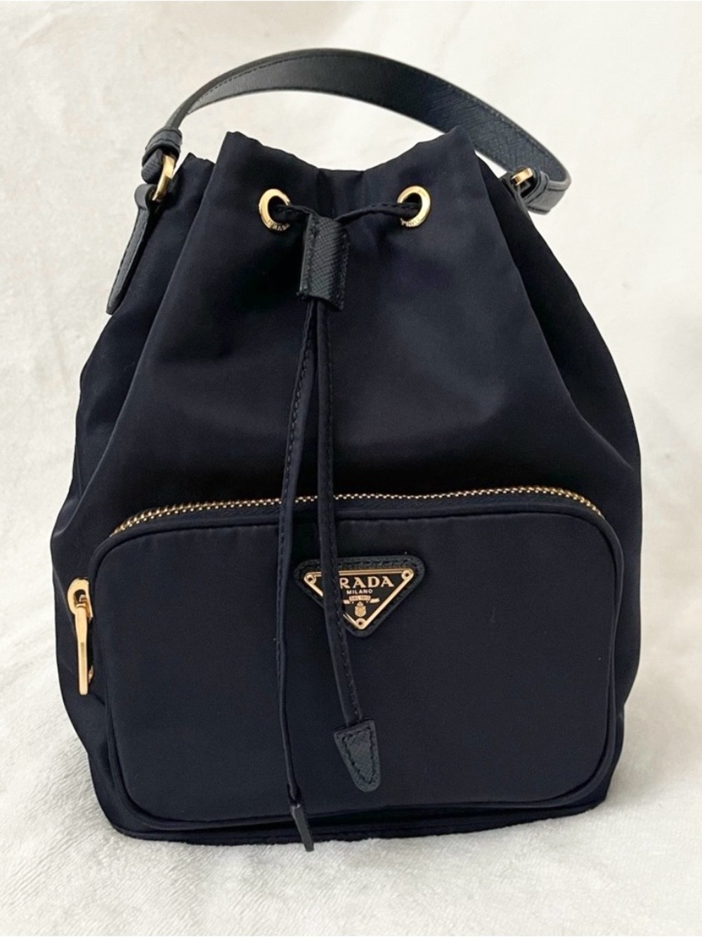Prada nylon bucket bag with gold hardware